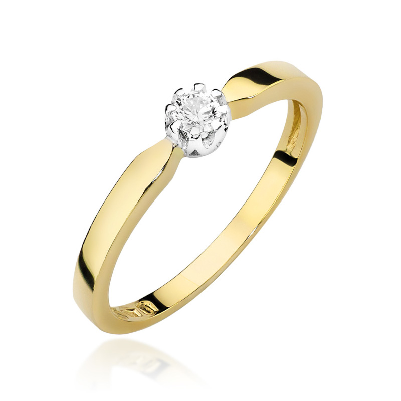 Klasyczny pierścionek zaręczynowy z diamentem o masie 0,10ct , umieszczonym w koszyku z białego złota.